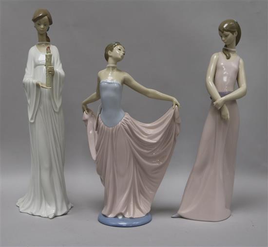 A Lladro figure, Dancer, No. 5050 and two other figures, height 36cm